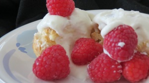 whipped cream (slug of Frangelico) & raspberries